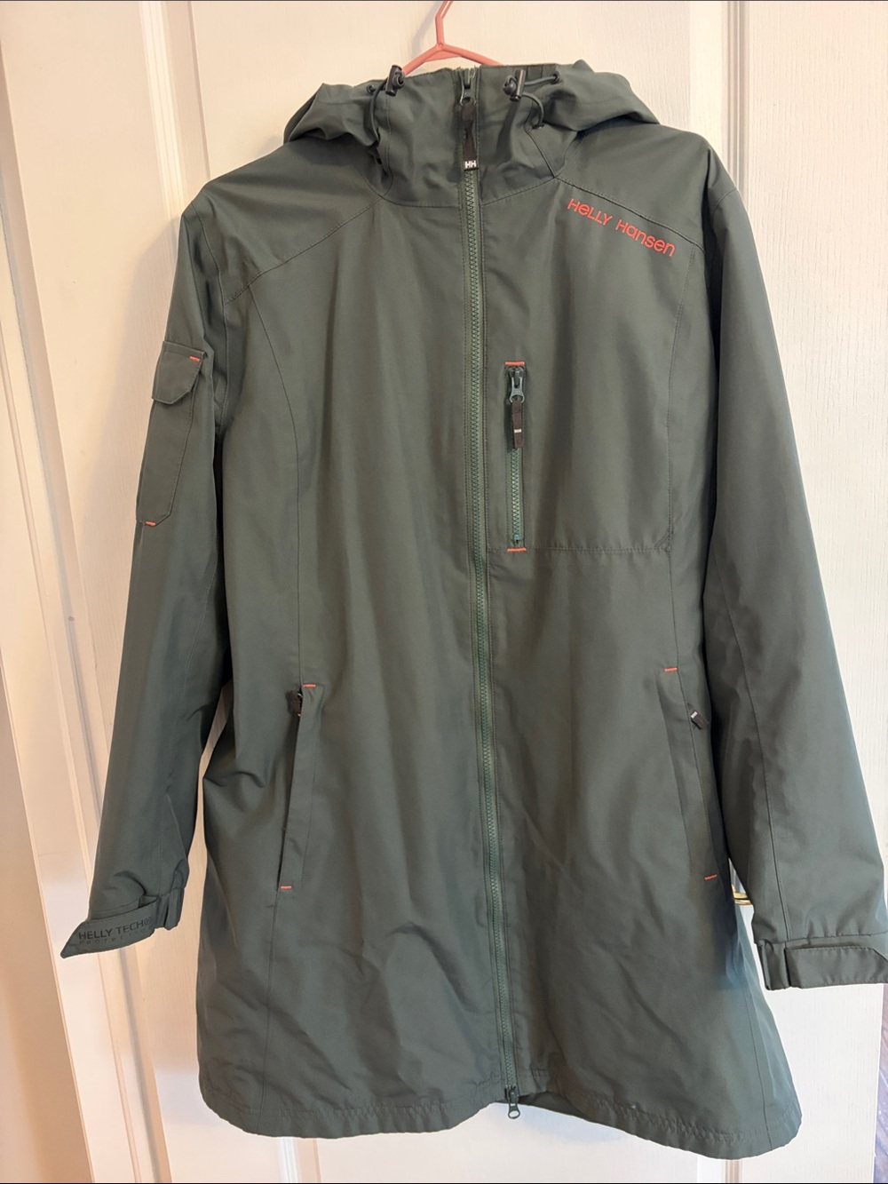 Helly Hansen Women’s Olive Green Hooded Raincoat with Subtle Pink Accents